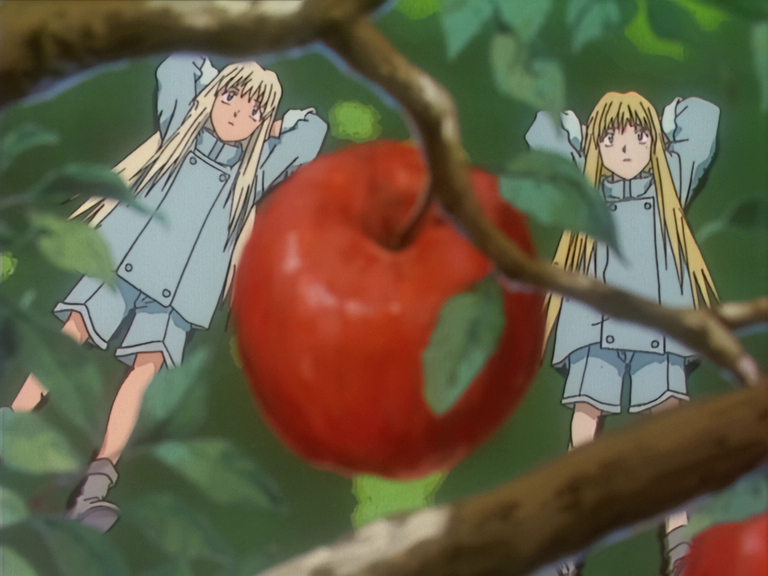 Vash and Knives look up at an apple tree in "Rem Saverem".