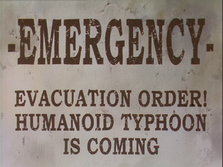 The emergency evacuation order from the Trigun (1998) opening credits.